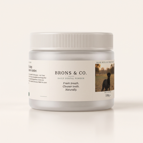 Brons & Co. Daily Dental Powder jar, wrap-around label showing brand story and dog photo, 100g net weight